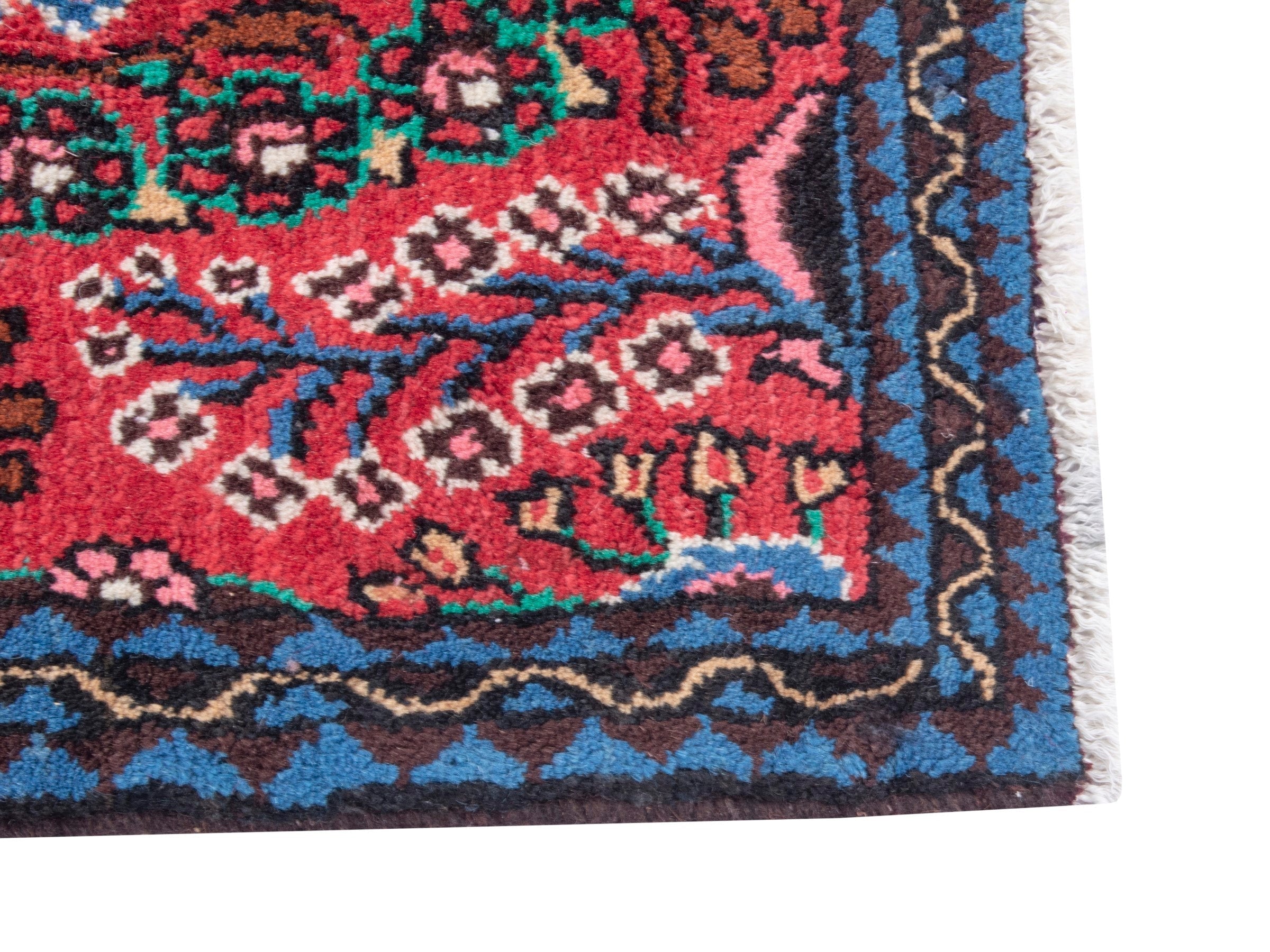 Persian Hamedan accent rug in deep red and dark blue, view 3 of 6