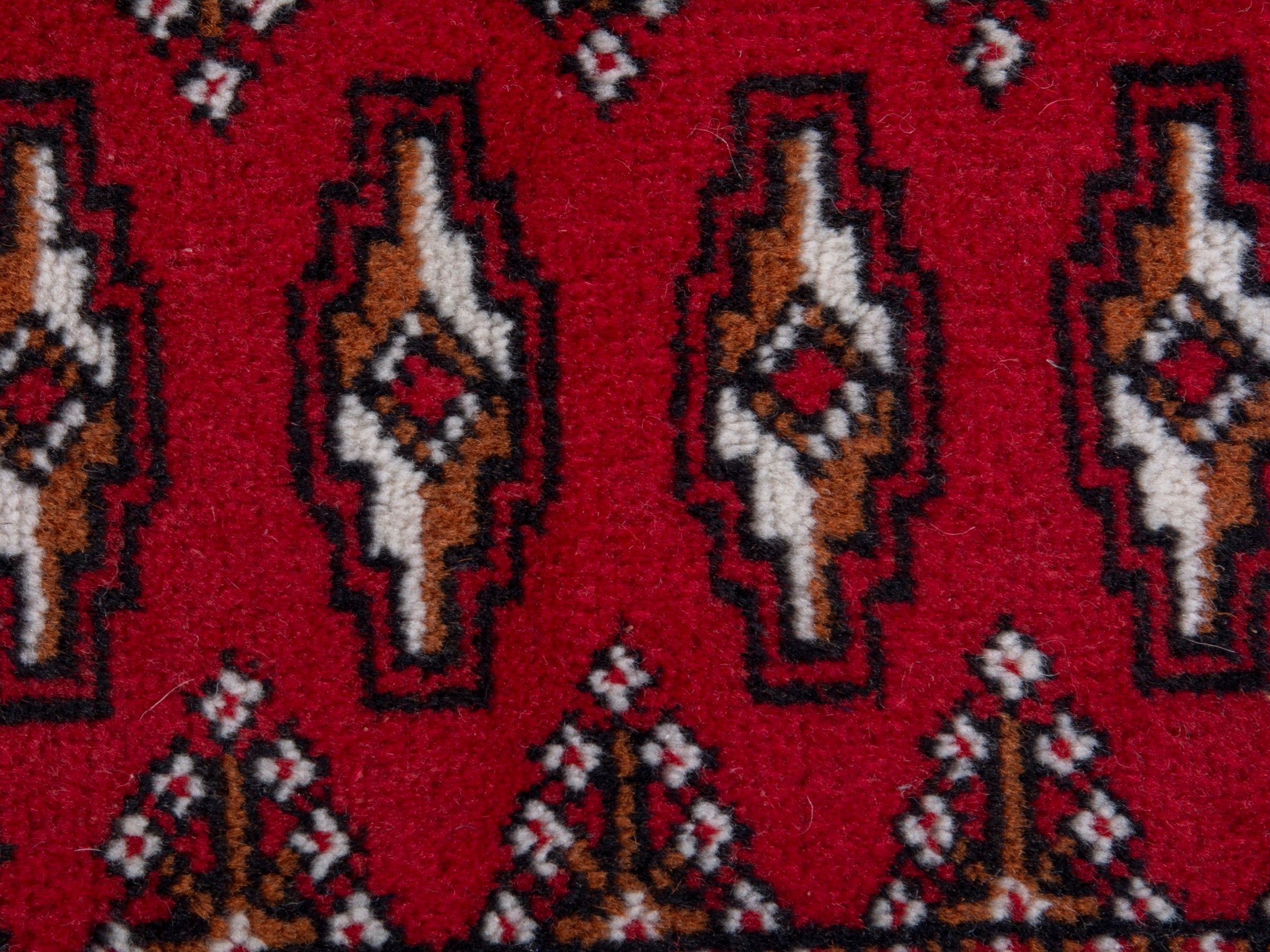 Persian Torkaman accent rug in deep red and dark brown, view 6 of 8