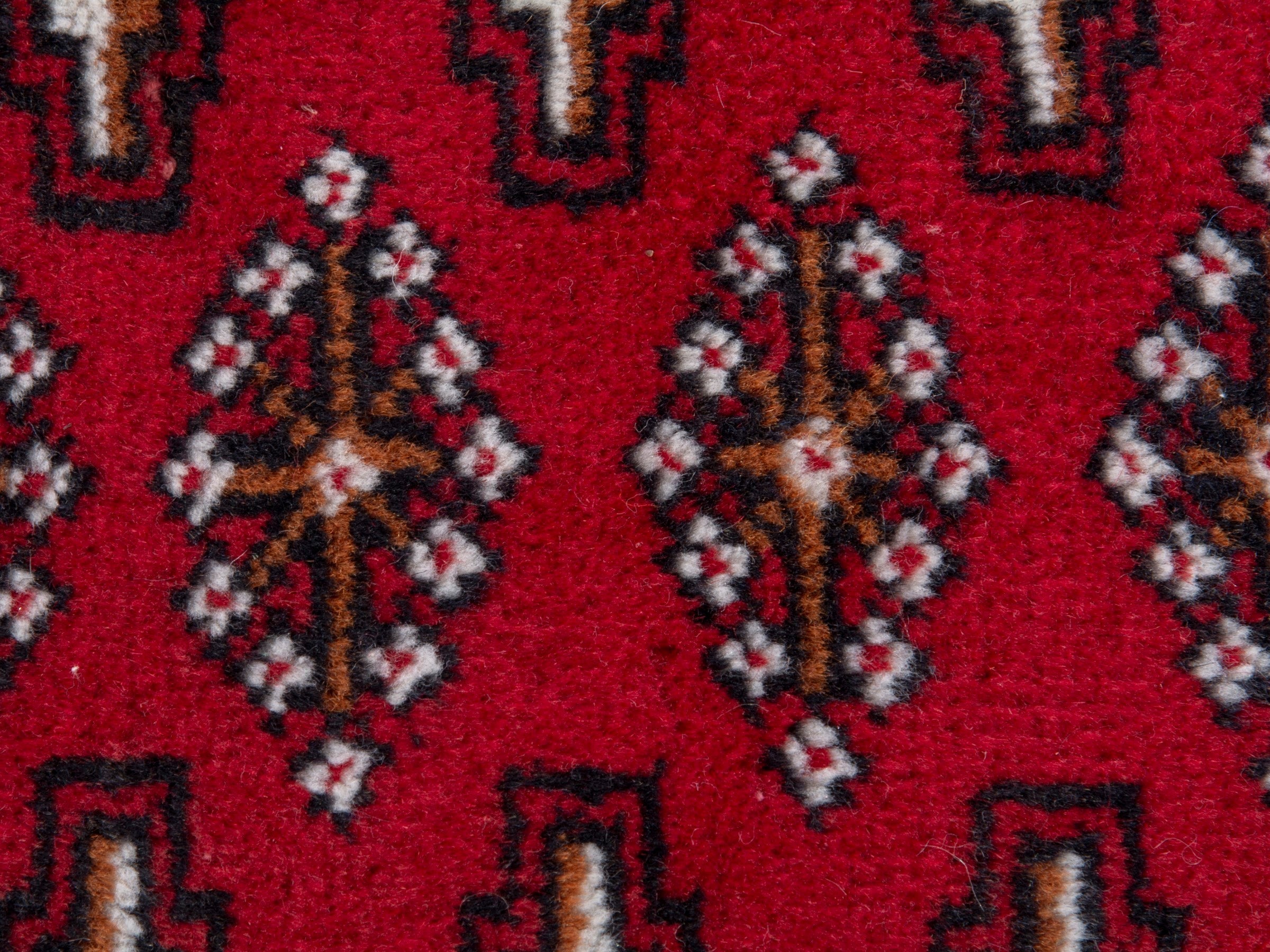 Persian Torkaman accent rug in deep red and dark brown, view 7 of 8
