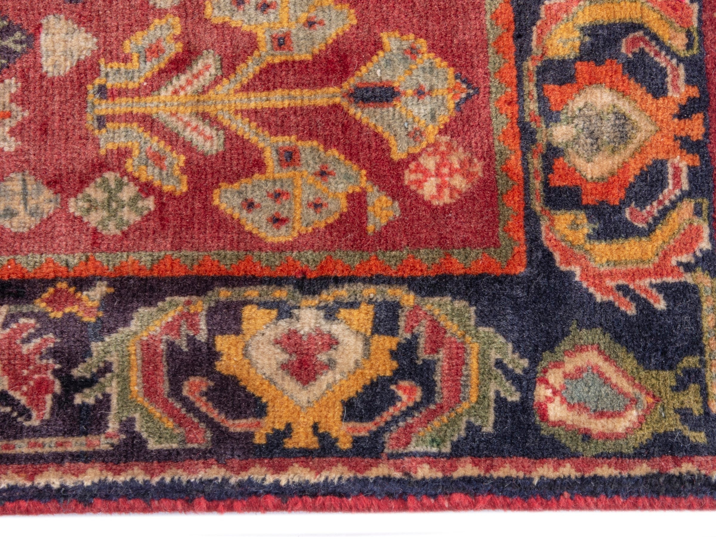 Persian Shiraz accent rug in deep red and rust, view 5 of 9