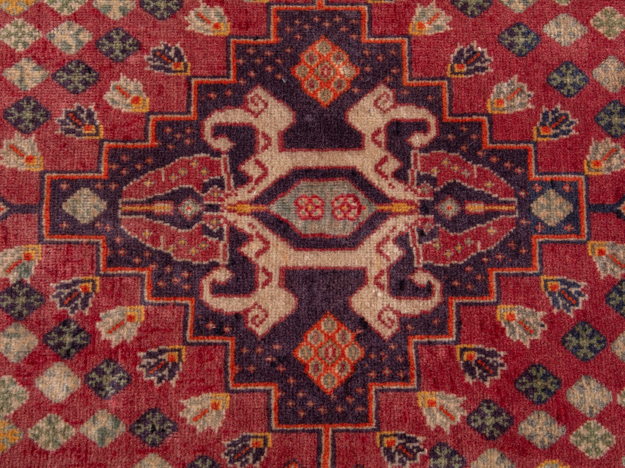 Persian Shiraz accent rug in deep red and rust, view 7 of 9