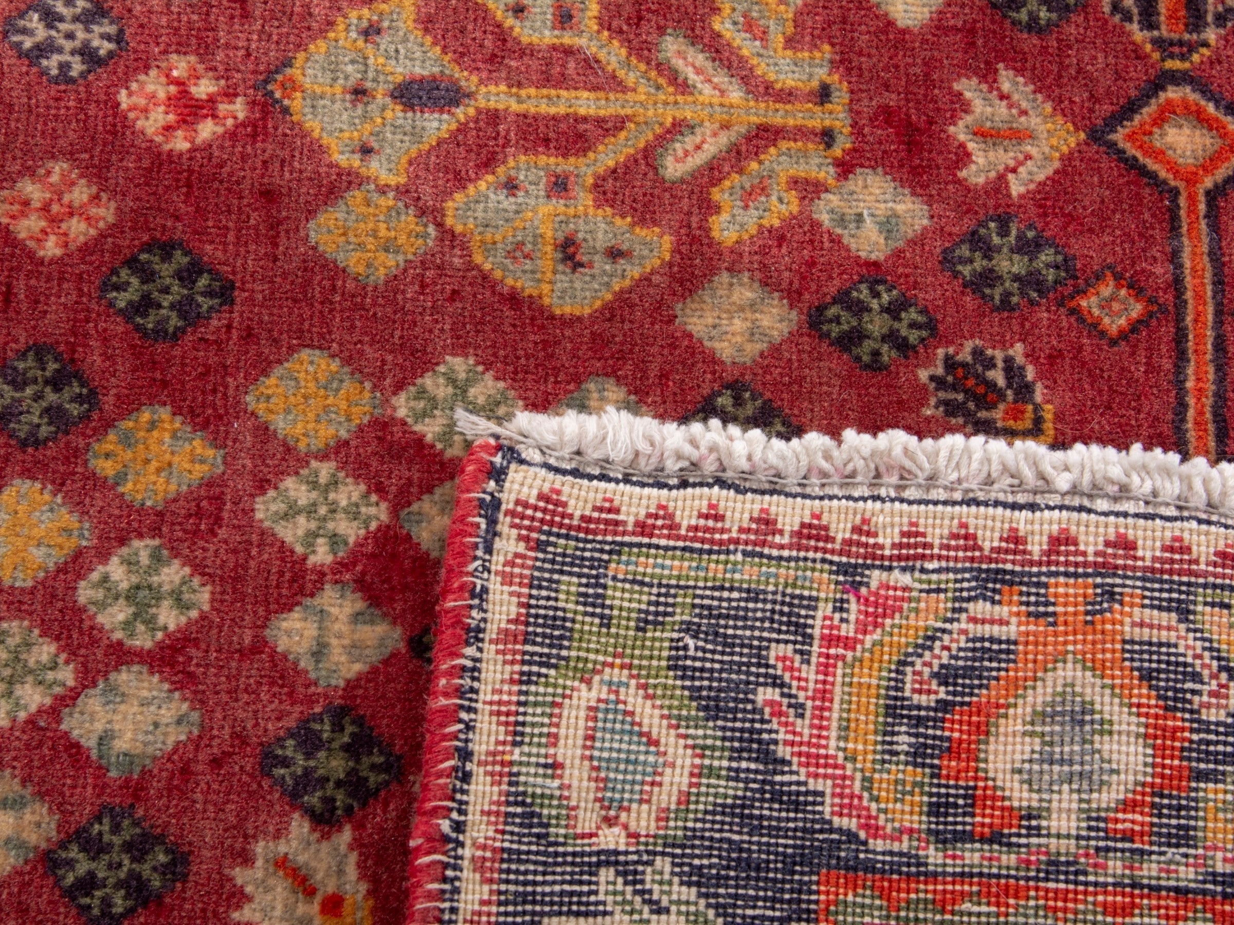 Persian Shiraz accent rug in deep red and rust, view 9 of 9
