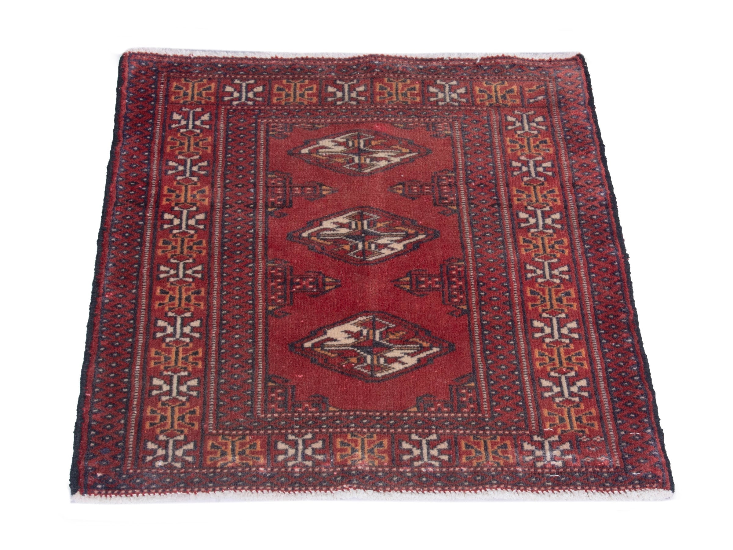 Persian Torkaman accent rug in deep red and cream, view 2 of 7
