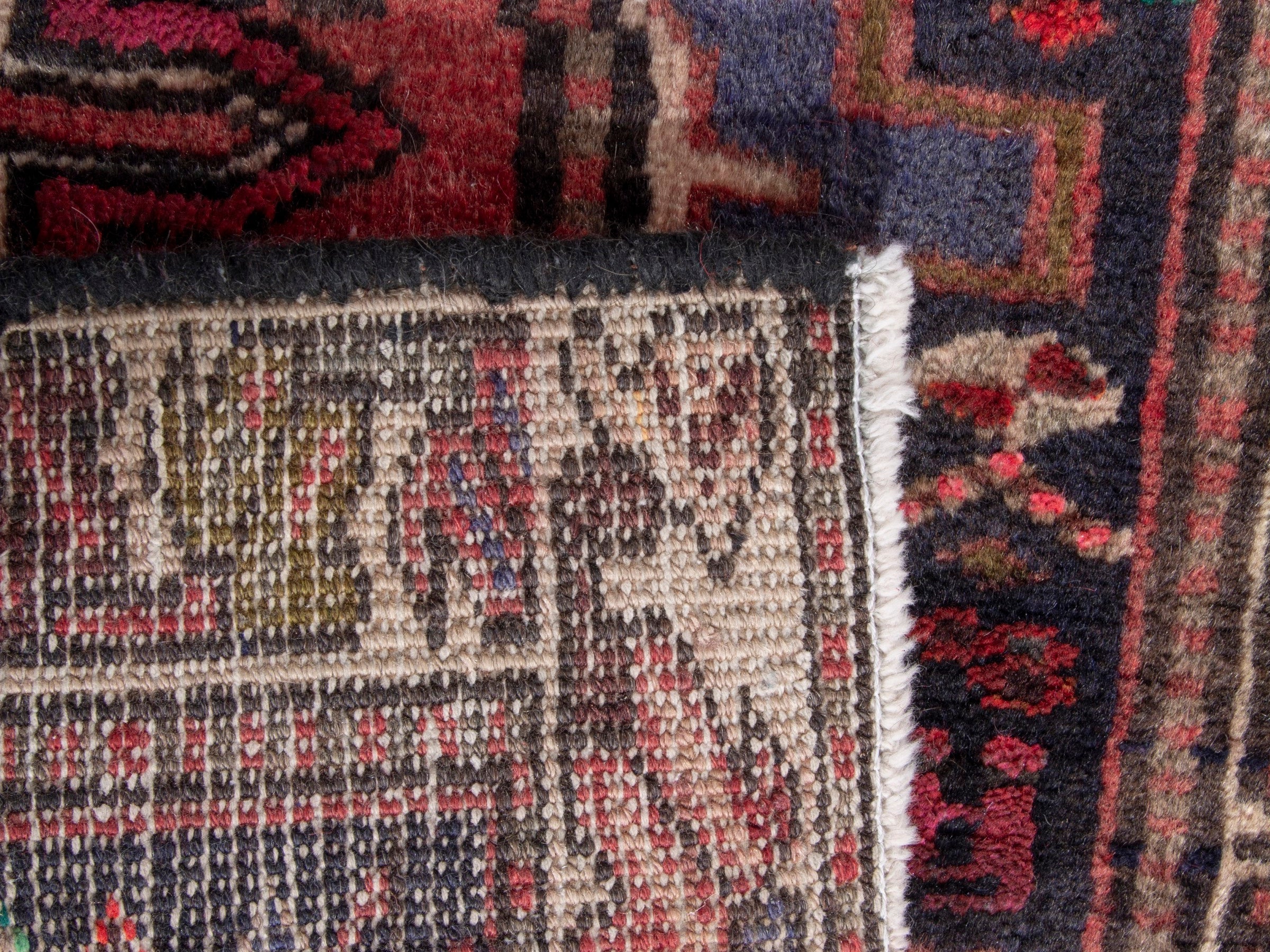 Persian Gharajeh accent rug in deep indigo and burgundy, view 7 of 7