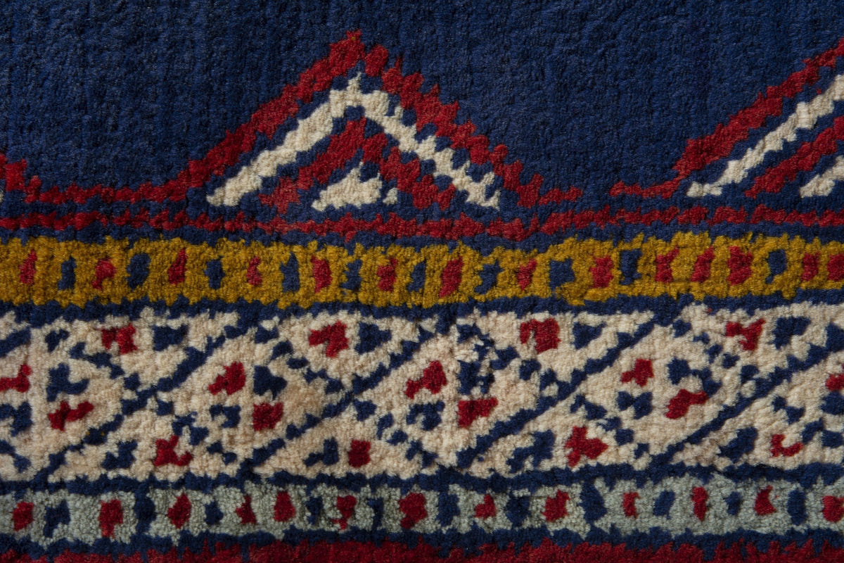 Persian Torkaman accent rug in navy and cream, view 8 of 10