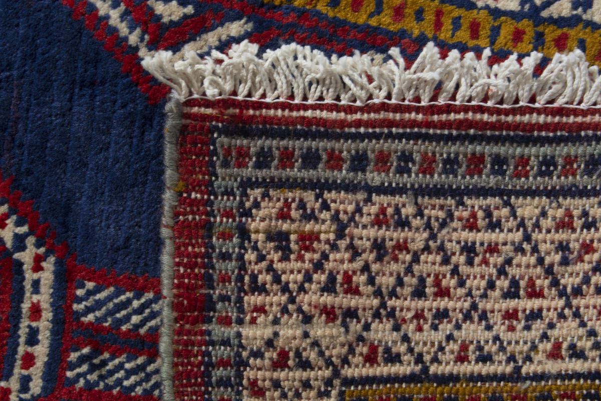Persian Torkaman accent rug in navy and cream, view 10 of 10