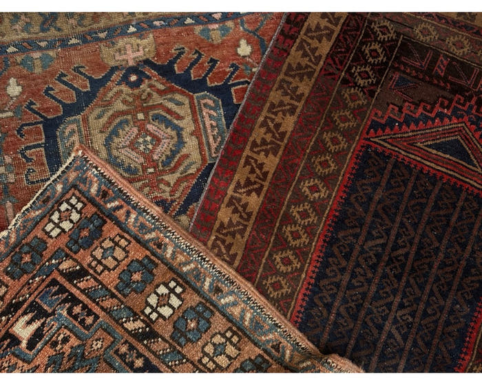 Vintage Persian and Balouch rugs stacked, new arrivals
