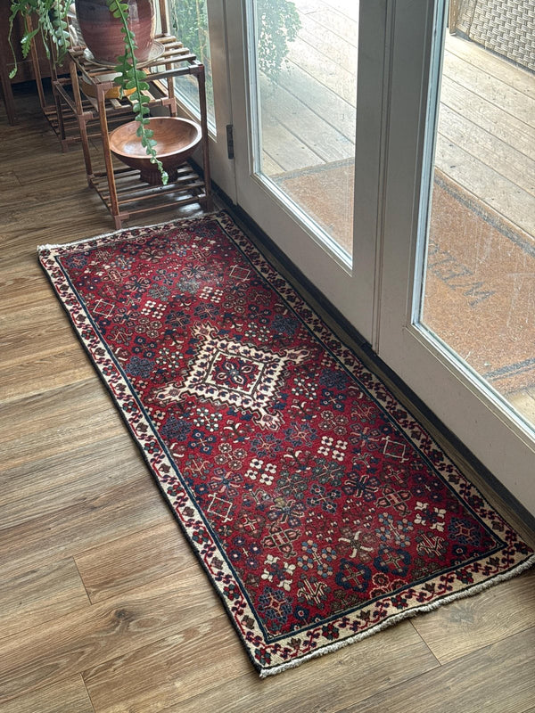 A customer's vintage rug at home