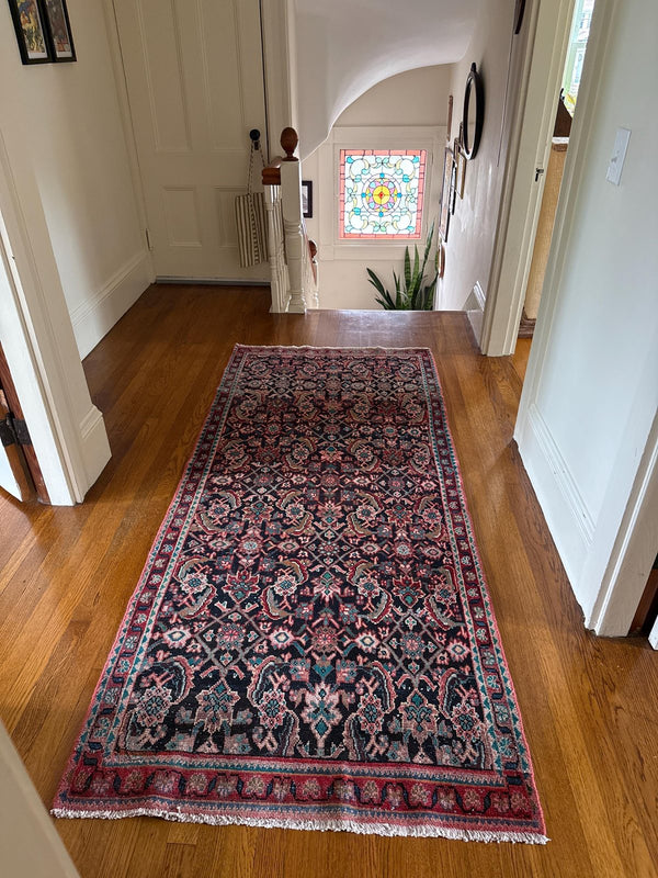 A customer's vintage rug at home