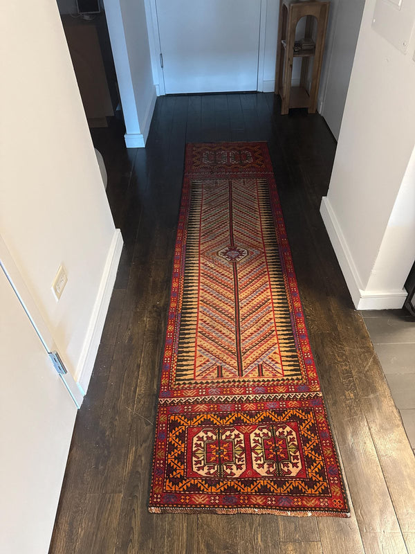 A customer's vintage rug at home