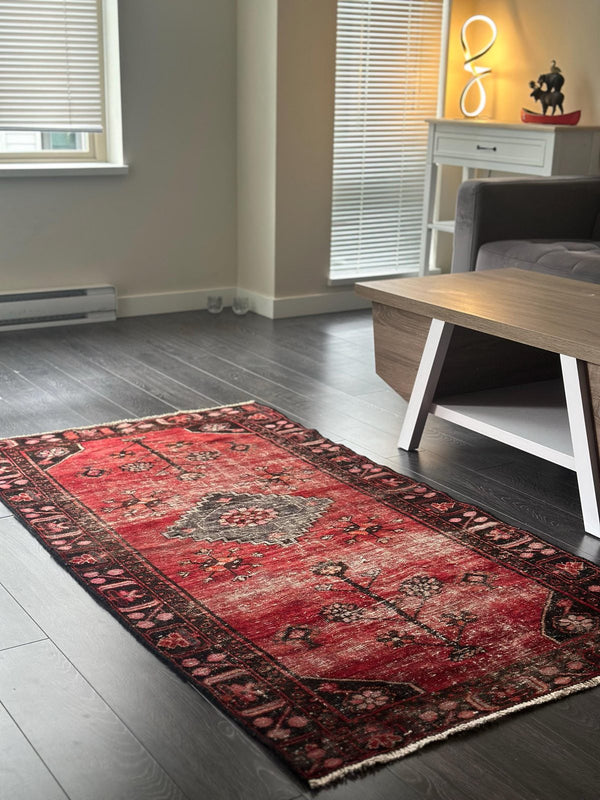 A customer's vintage rug at home