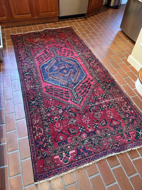 A customer's vintage rug at home