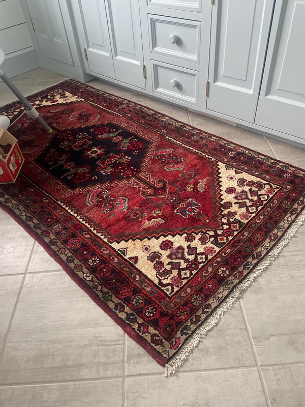 A customer's vintage rug at home