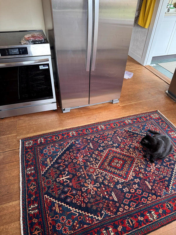 A customer's vintage rug at home