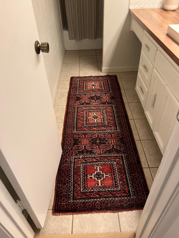 A customer's vintage rug at home