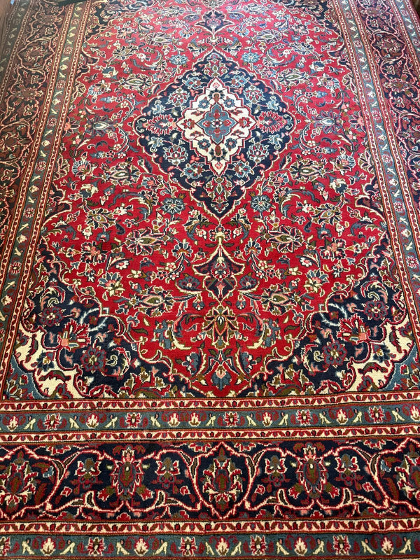 A customer's vintage rug at home
