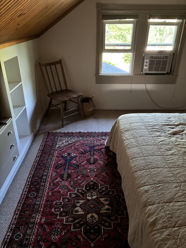 A customer's vintage rug at home