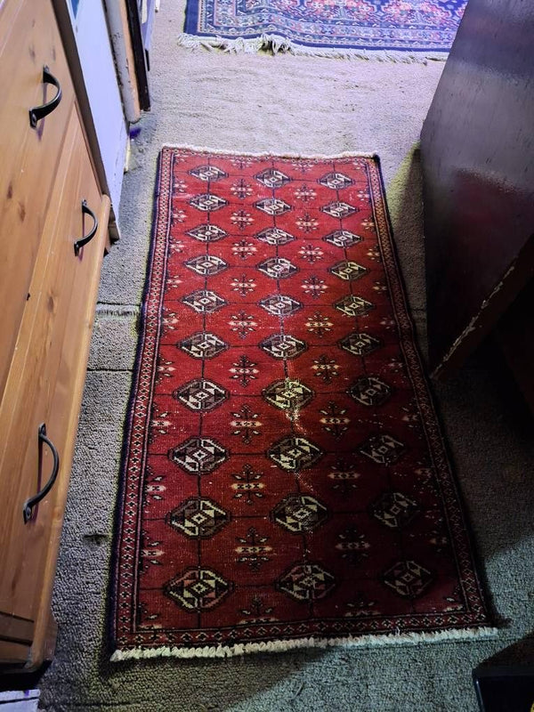 A customer's vintage rug at home