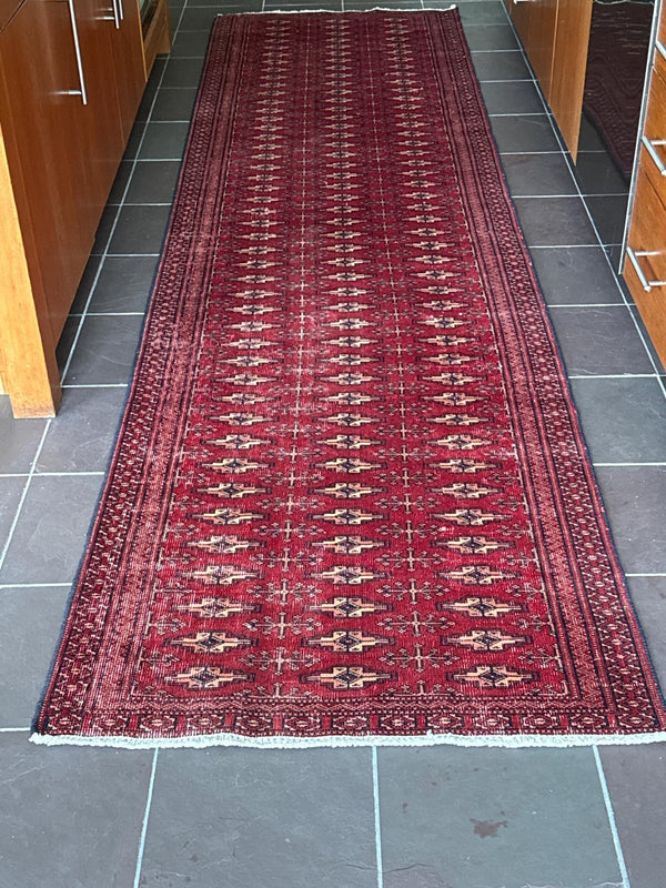 A customer's vintage rug at home