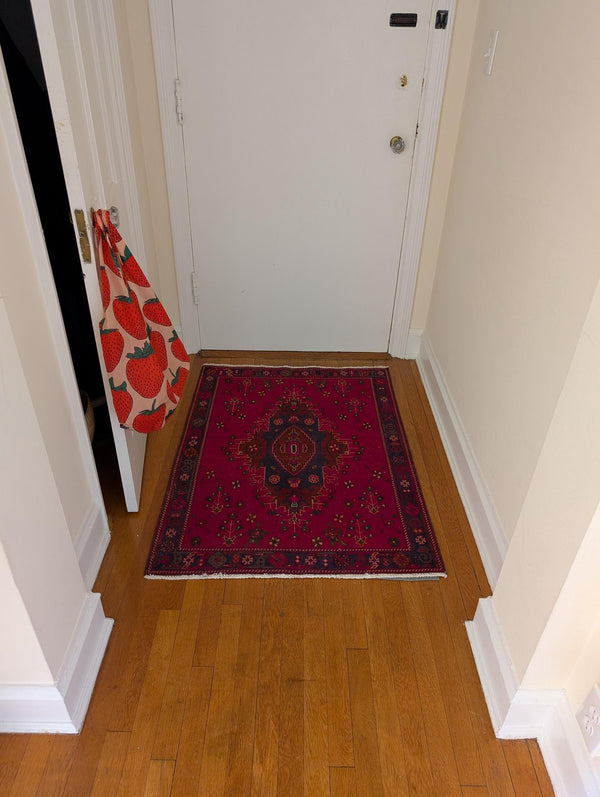 A customer's vintage rug at home