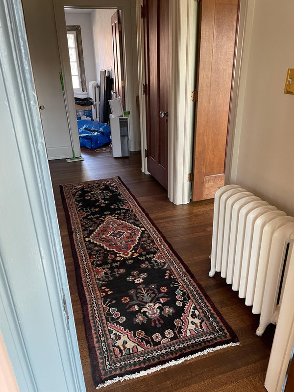 A customer's vintage rug at home