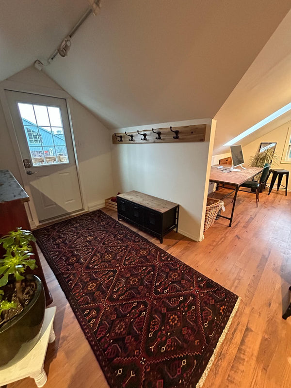 A customer's vintage rug at home
